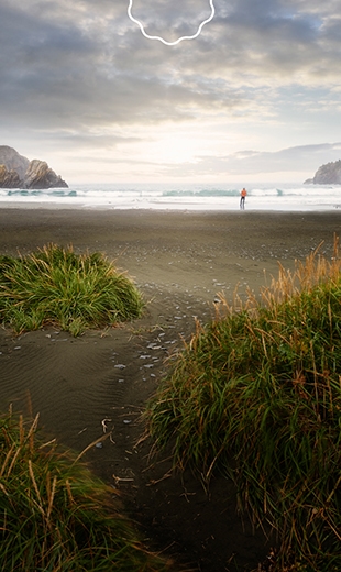 A traveller is exploring the beach in Salmon Cove.