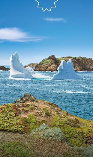 A massive iceberg makes its way through the waters in Twillingate. 